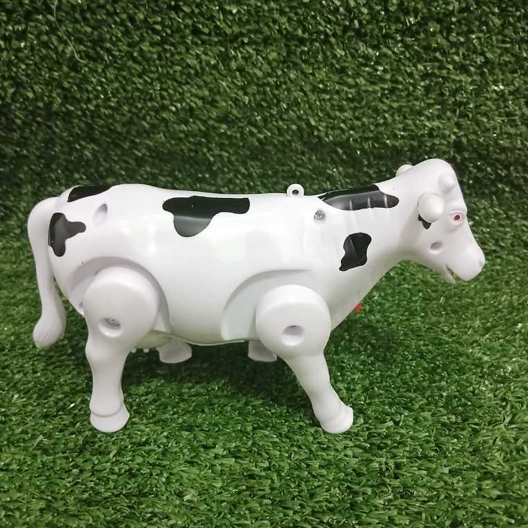 Jual Mainan hewan binatang sapi putih cow bunyi suara dan musik Kota ...