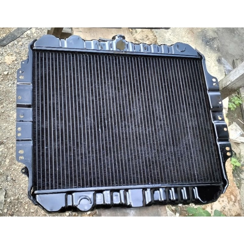 Jual Radiator 2 ply Panther 2.5 kapsul/touring original denso copotan ...