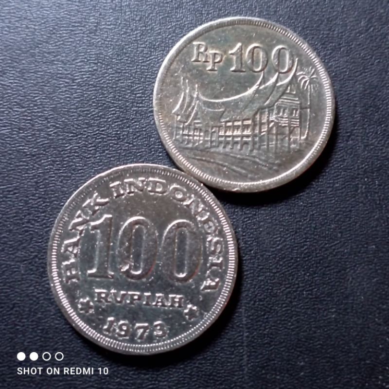 Jual uang koin kuno 100 rumah gadang tahun 1973 bekas asli utuh