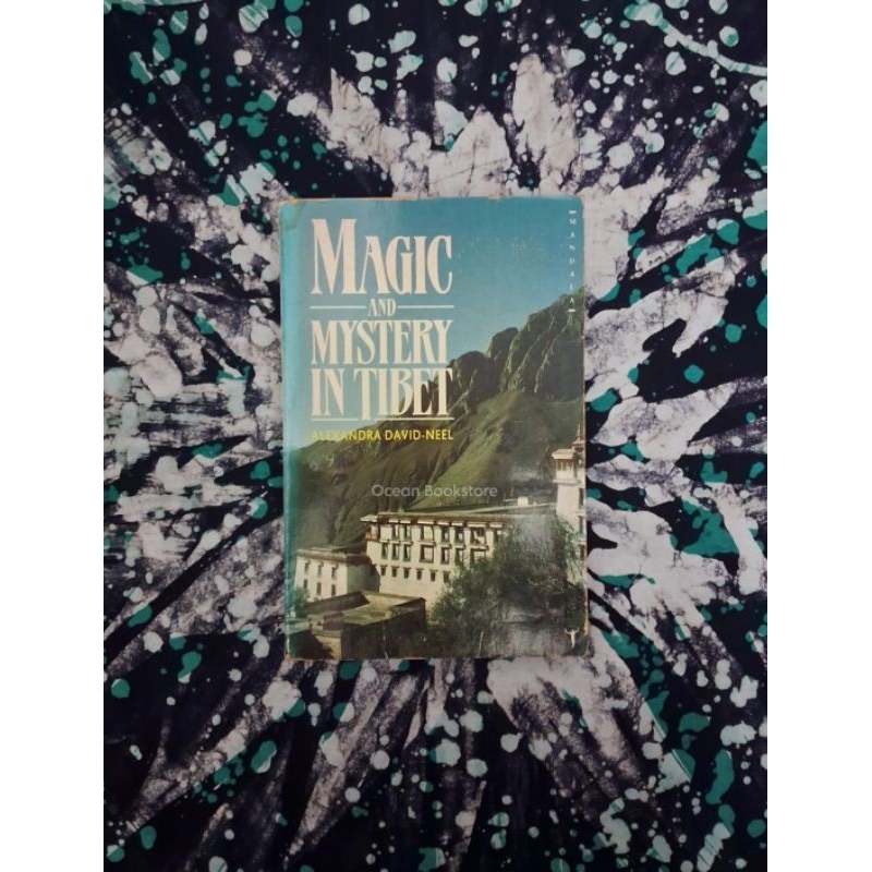 A book titled 'Magic and Mystery in Tibet' by Alexandra David-Neel displayed on a Shopee Indonesia listing, with a blurred background of a market stall.