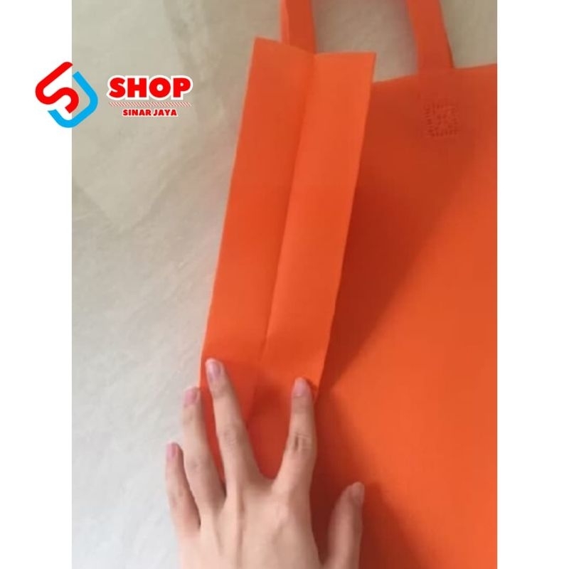 Jual Tas spoundbound handle lipat samping 25x35x8 ketebalan 65gsm ...