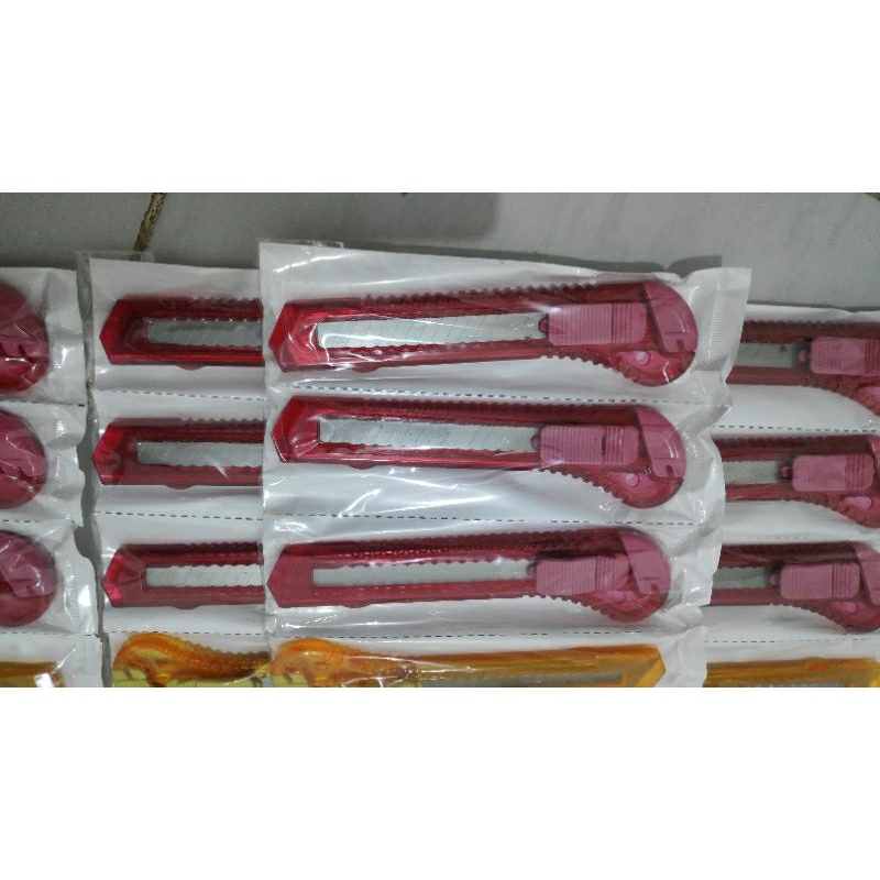 Jual Cutter kertas bening merk Eksis Besar harga per renceng isi 12 pcs ...