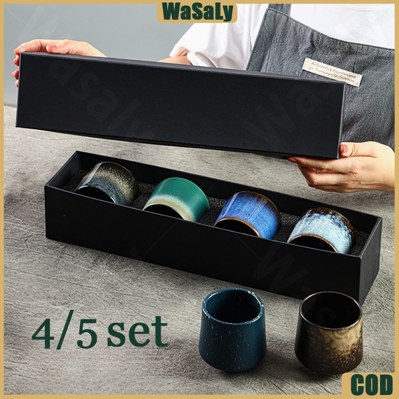 Teh Delima with Turkish Delight dalam cangkir kaca dengan hiasan daun mint