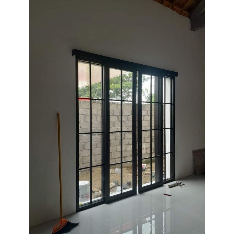 pintu aluminium sleding dobel lebar 280 x tinggi 210 ornamen +kaca mati 2 kolom kaca full 5 mm