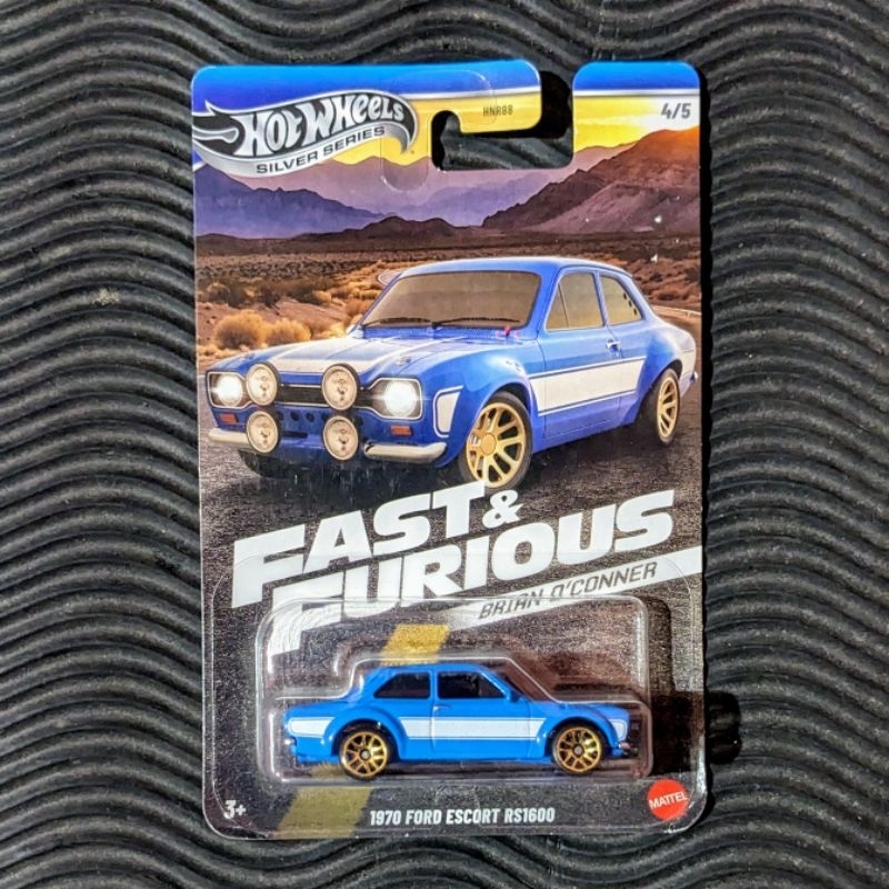 Hot Wheels id Voiture Ford Escort RS1600 '70 avec Puce NFC intégrée, Identification Unique, échelle 1/64, Jouet pour Enfant, 8 Ans et Plus, FXB41