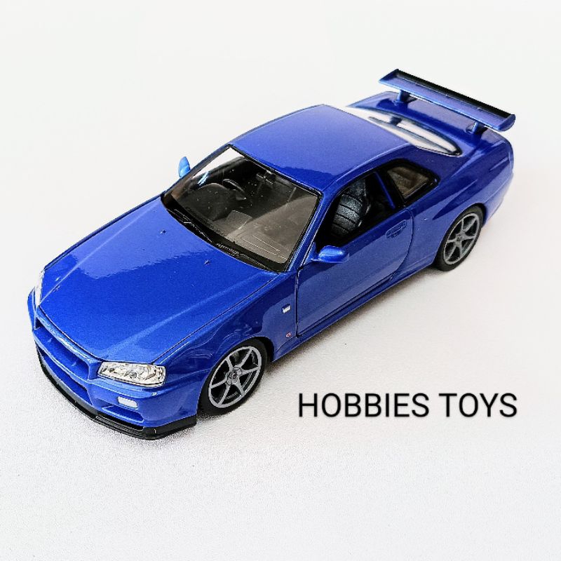 Jual DC Diecast Welly Nex 1/24 Nissan Skyline GTR R34 | Shopee Indonesia