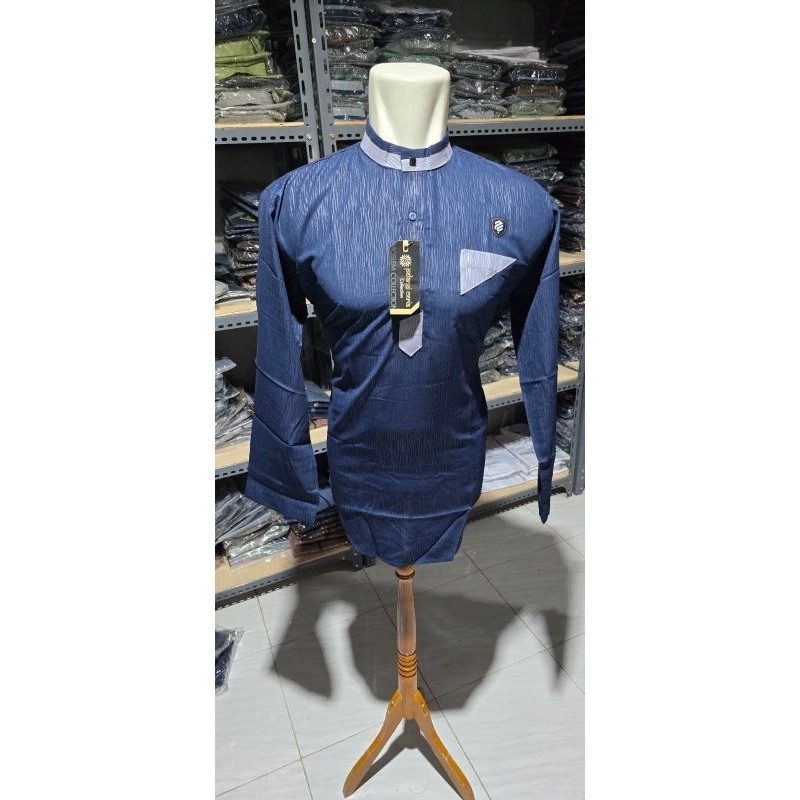 BAJU KOKO BAHAN WOLFICE PANJANG ( EMBOS MOTIF KAYU )
