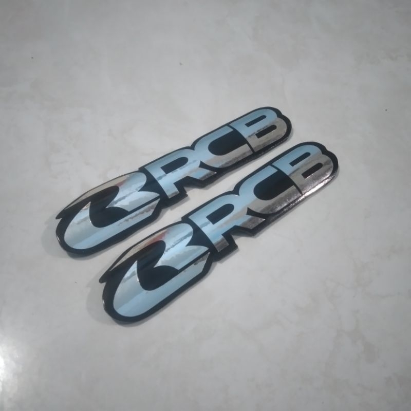 Jual EMBLEM SHOCK DEPAN RCB 1SET ( KANAN KIRI ) | Shopee Indonesia