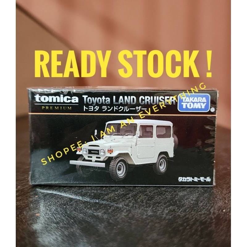 Modellino Tomica Toyota Land Cruiser Polizia UK - Edizione Limitata Aeon Scala 1:71