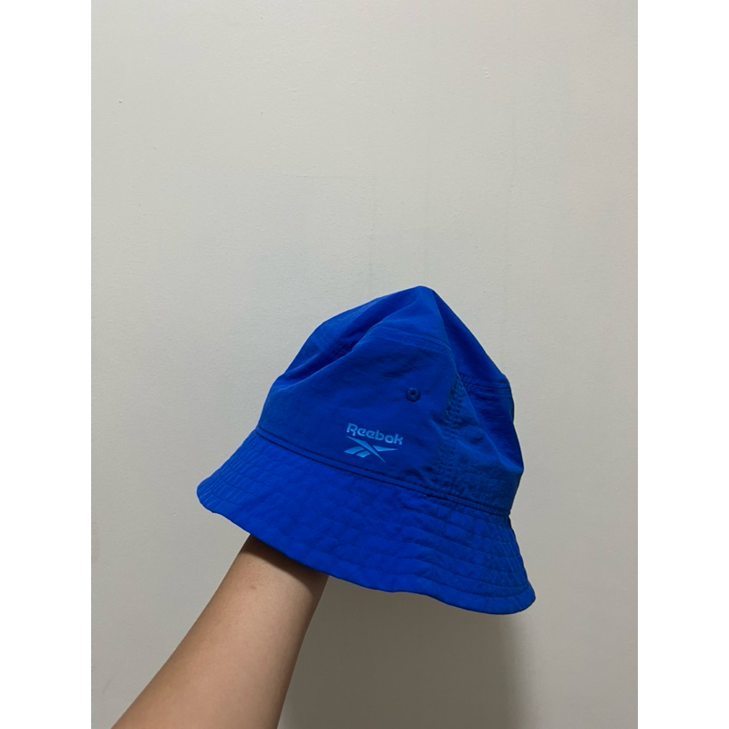 Jual Topi bucket hat parasut/ katun Reebok biru dan merah sale 80% ...