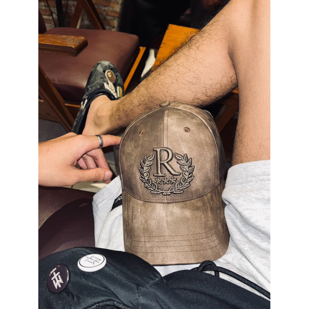 Jual topi rucas coklat original like neww | Shopee Indonesia