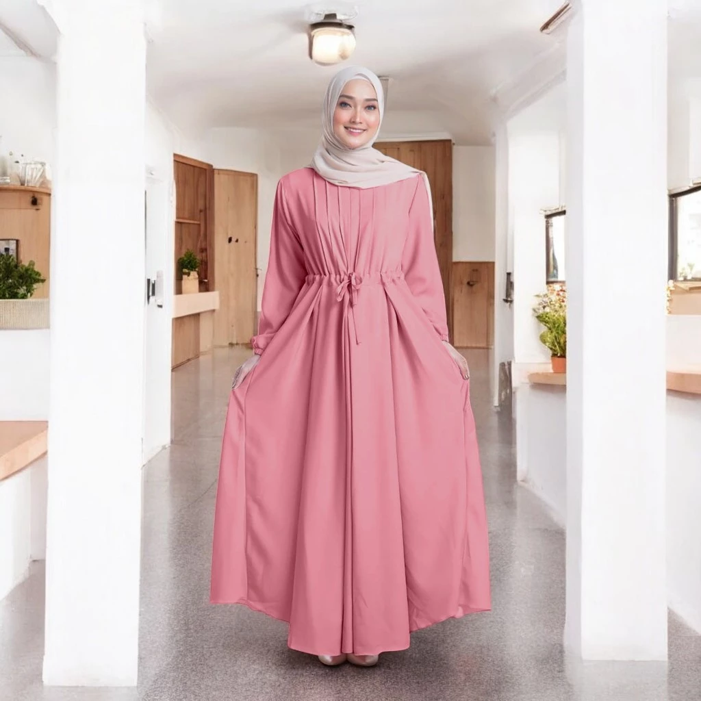 Gamis polos wanita muslimah tampilan sederhana