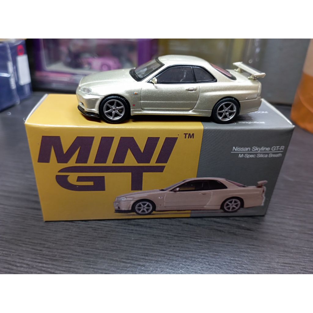 Jual Mini Gt Nissan skyline GT-R R34 M-Spec Silica Breath miniscale 1/ ...
