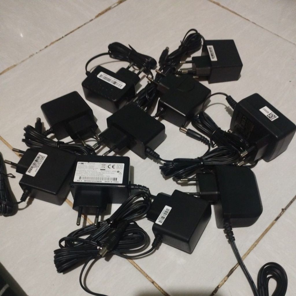 Jual Adaptor router stb ont router cctv dll 12V-1A original | Shopee ...