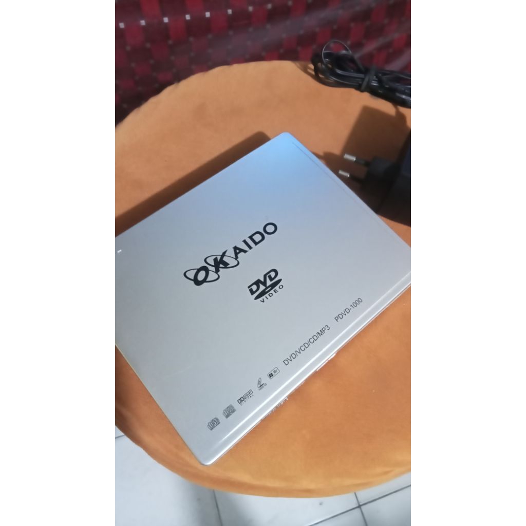 Jual DVD player mini merk OKAIDO model PDVD 1000 kondisi minus | Shopee ...