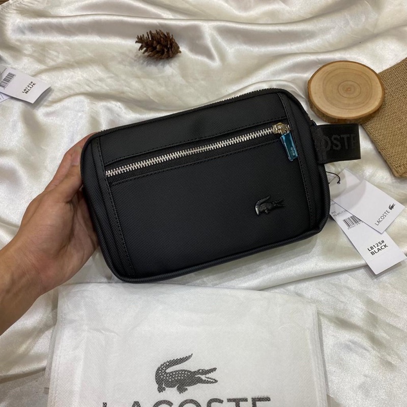 Clutch deals bag lacoste