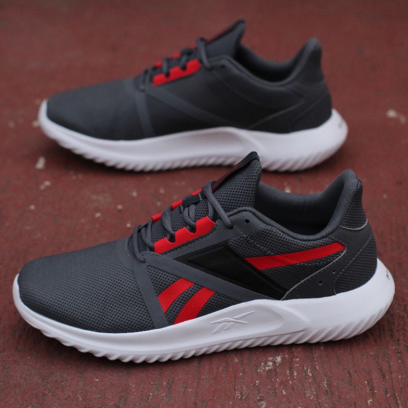 Jual sepatu reebok energylux men running shoes grey red original