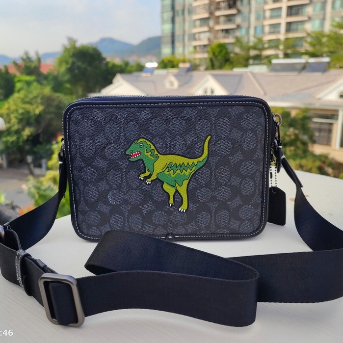 Coach dinosaur sling bag sale