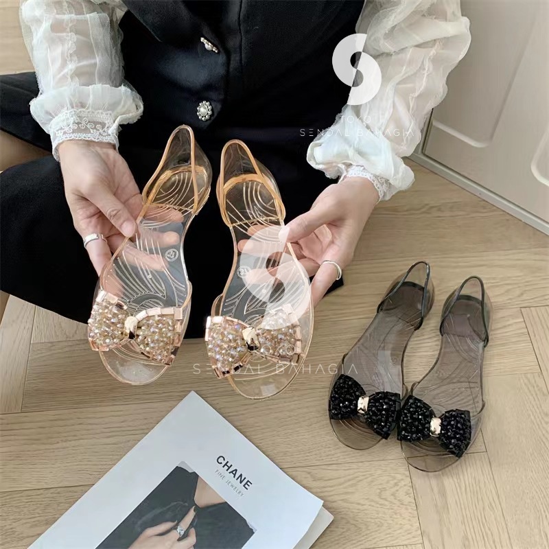 Jual Sepatu flat shoes kaca transparant wanita motif pita