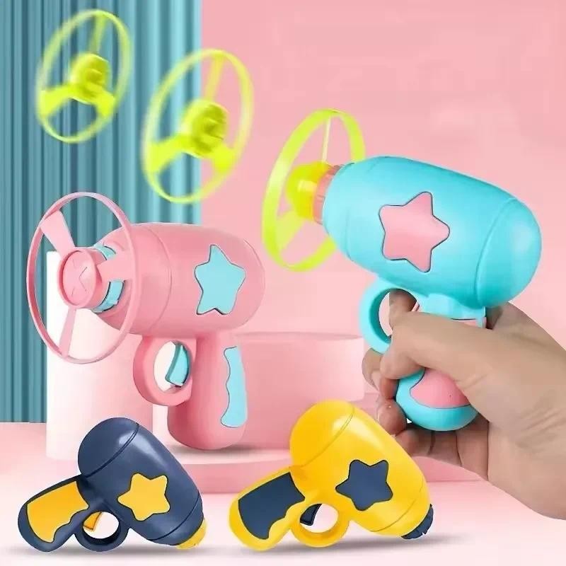 Jual Children Saucer Launcher Pistol Outdoor Spinning Top Dinosaur Gun ...