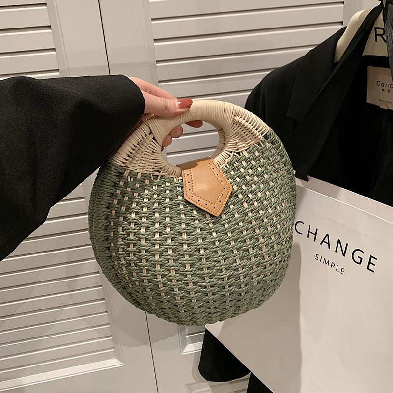 This year's popular niche design straw woven bags new westernized small  round bag