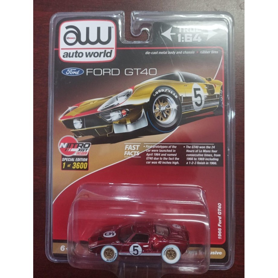 Auto World 1:64 1965 Ford GT40 Race Worn Diecast With Flag Man Figure - Mijo Exclusives