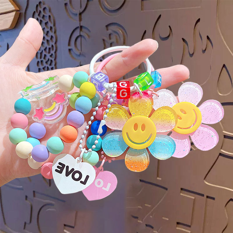 Jual bunga rantai gradasi gantungan kunci bag charm matahari smile ...