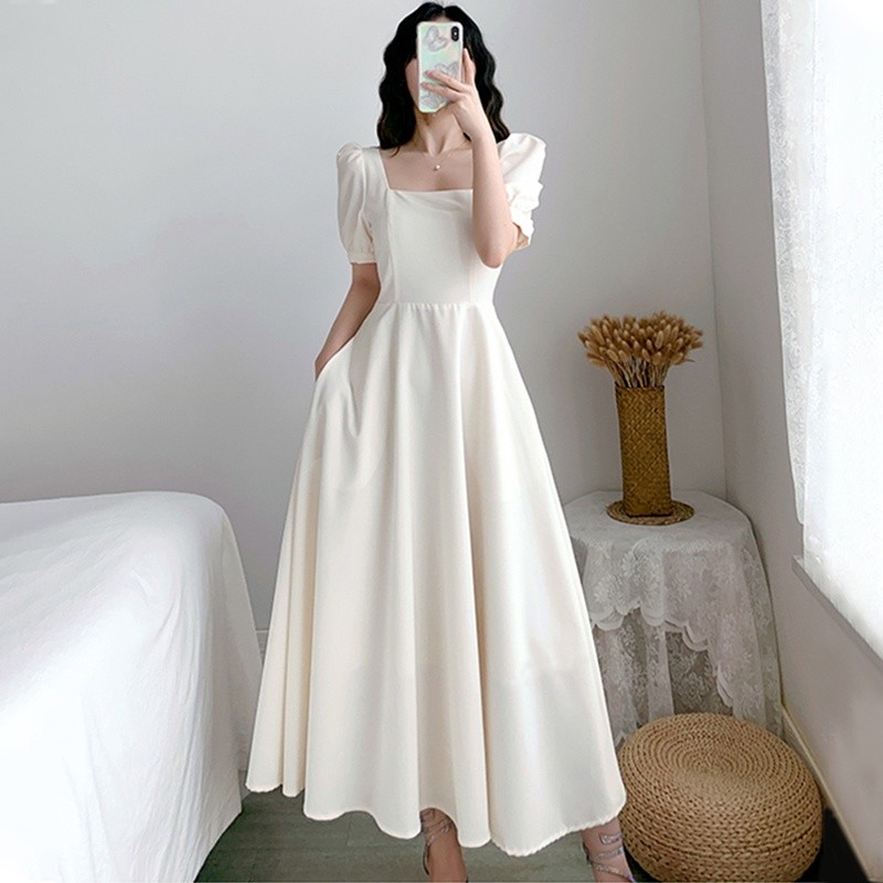White dress below the knee top